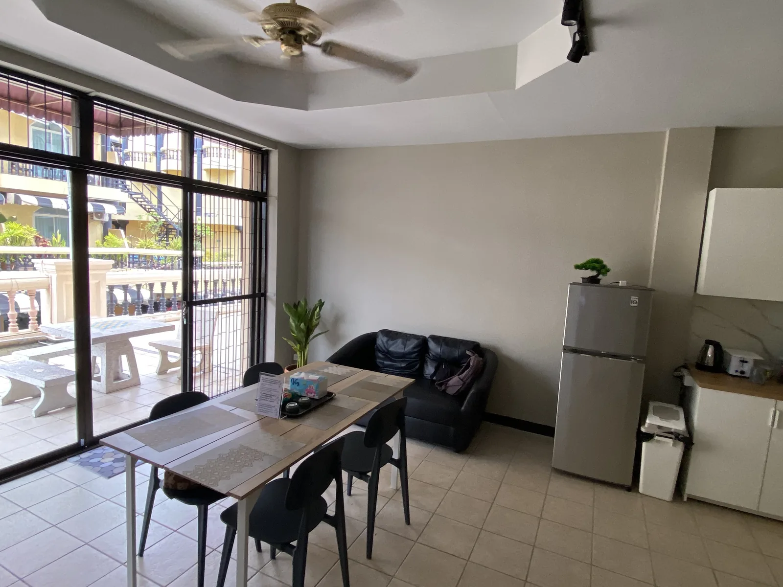 Furnished 4th-floor apartment, living room